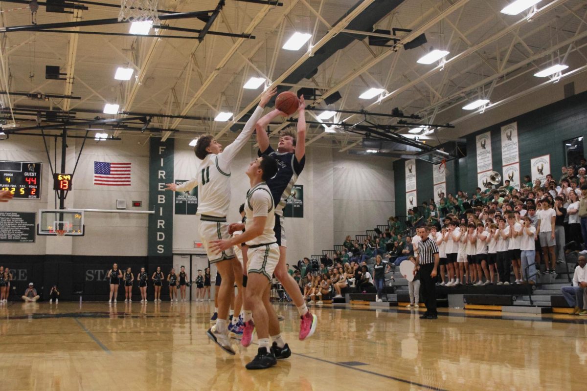 Senior Carter Kaifes steps back to hit a fadeaway over a defender