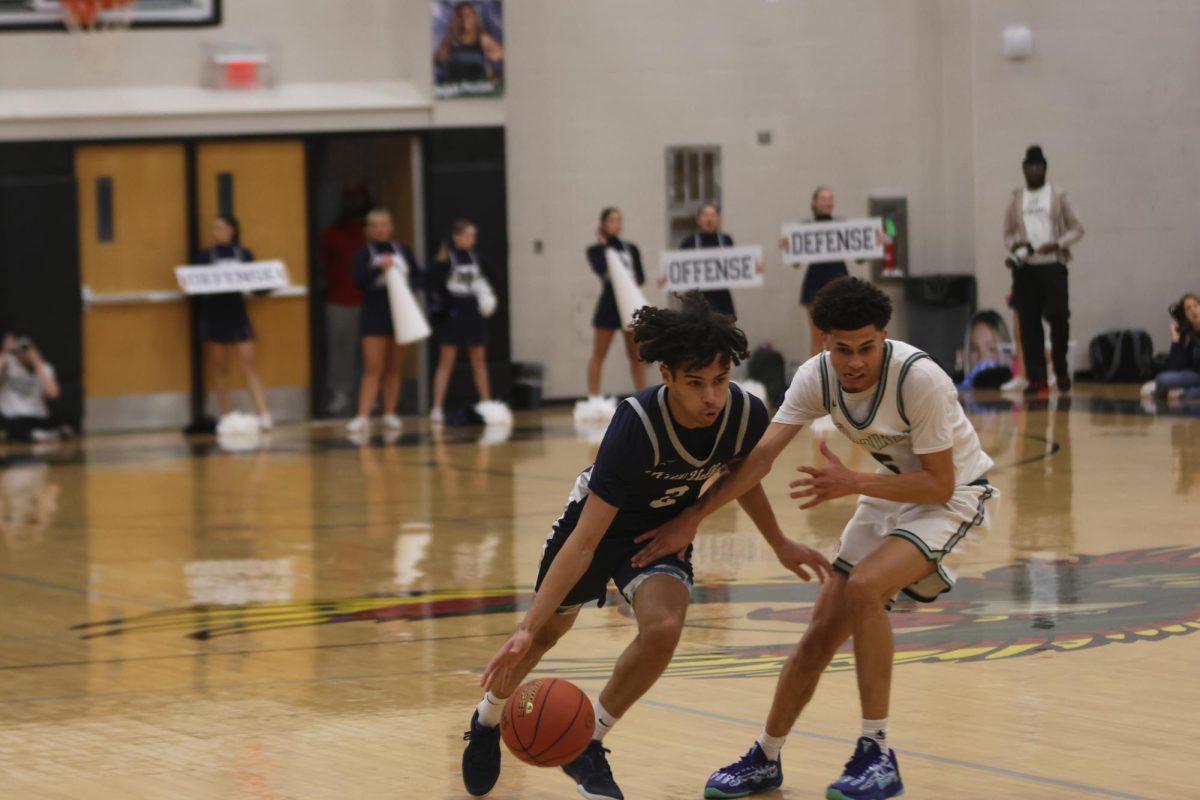 Junior Jakhai Carter blows by a defender while showing off his skills