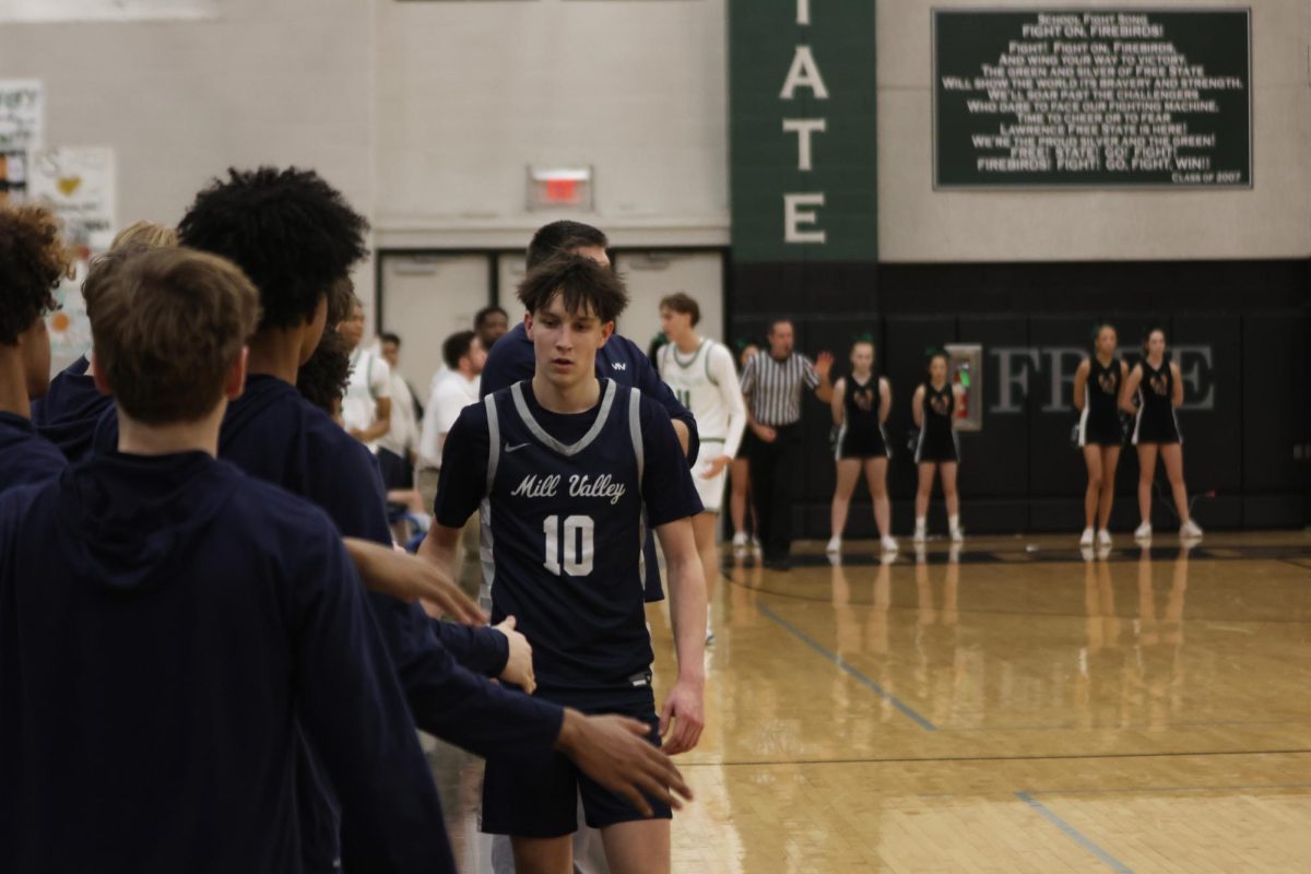 Junior Jack Carpenter walks down the line after coming out of the game